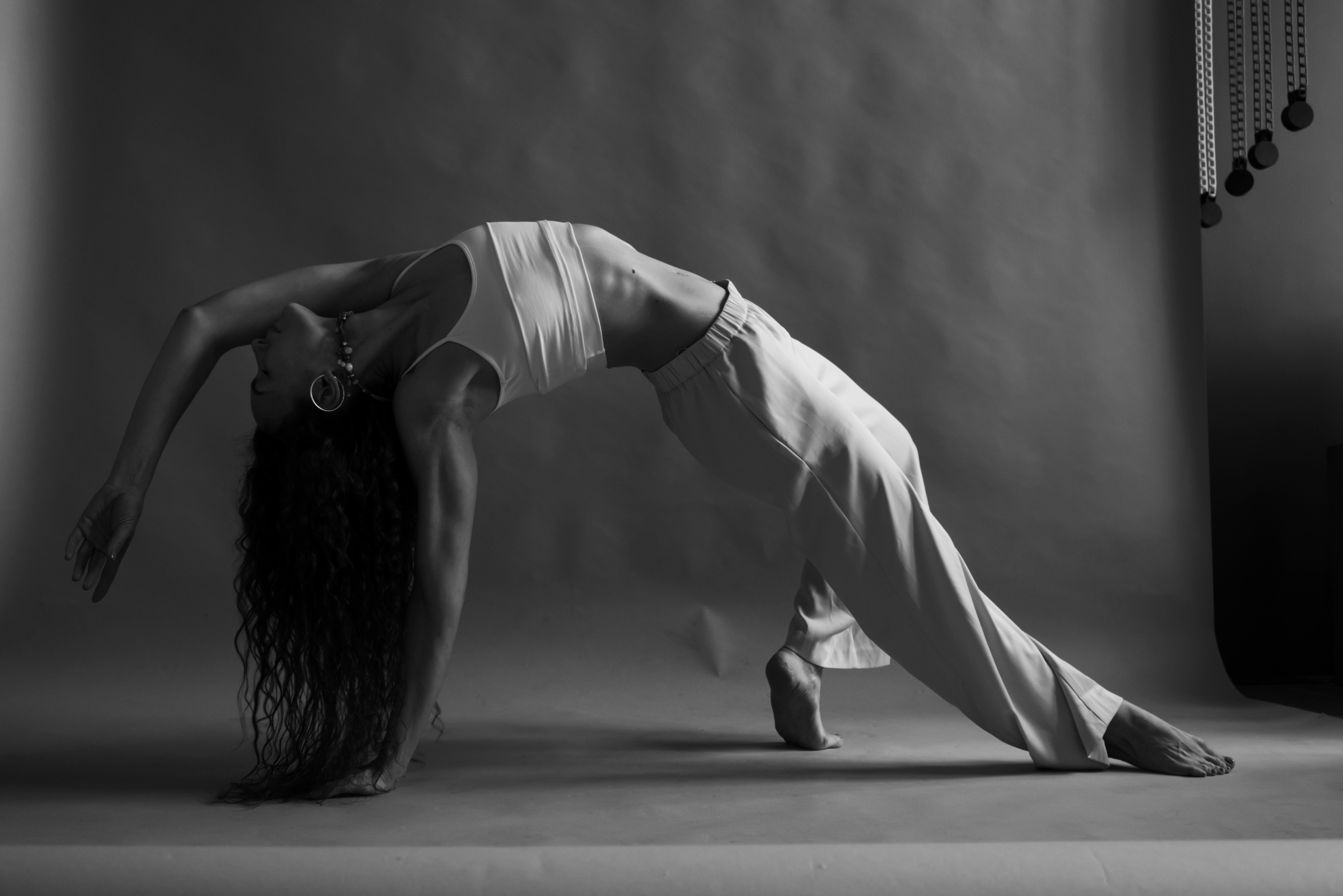 A close portrait, eyes closed. The body finding its way back to balance.